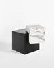 Blackened steel cube base, white carrara marble cube top side table. 
