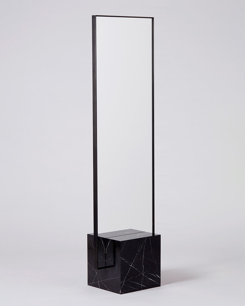 Standing mirror with nero marquina cube base and rectangular blackened steel mirror frame.