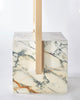 Cube base detail image of standing mirror with white marble base and brass mirror frame